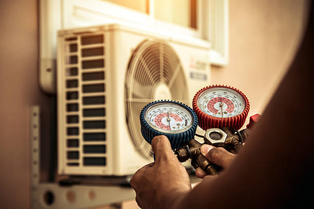 Professional Air Conditioning Service technician working in Myra, TX